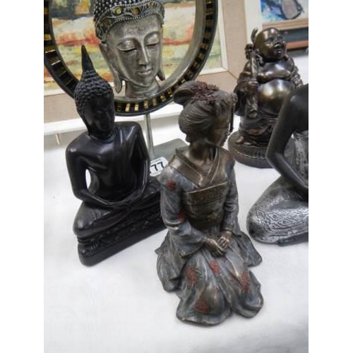 777 - A collection of 20th century oriental figures including Buddha and other Dieties.