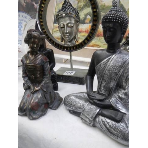 777 - A collection of 20th century oriental figures including Buddha and other Dieties.