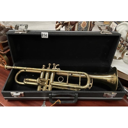 814 - A cased trumpet.