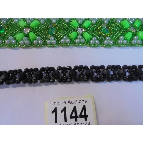 1144 - A green stone choker, a black stone choker and one other.