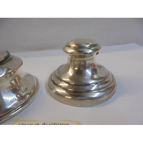 1155 - Two good hall marked silver inkwells with glass liners.