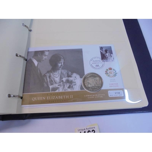 1163 - An album of Queen Elizabeth II 80th birthday coin covers and three other coin covers.