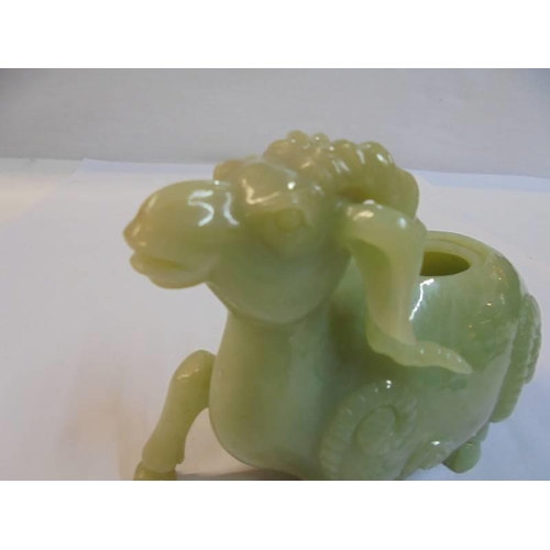 1173 - An early Chinese carved stone ram, missing lid, (possibly Jade).