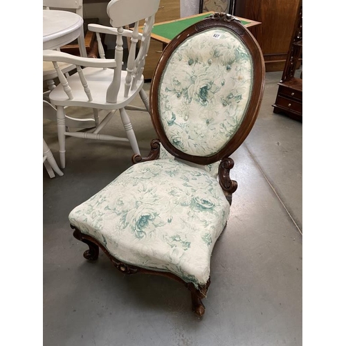 827 - An oval back nursing chair with rose print fabric A/F COLLECT ONLY