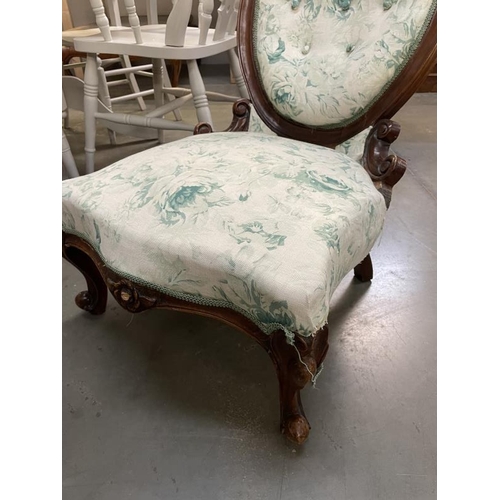 827 - An oval back nursing chair with rose print fabric A/F COLLECT ONLY