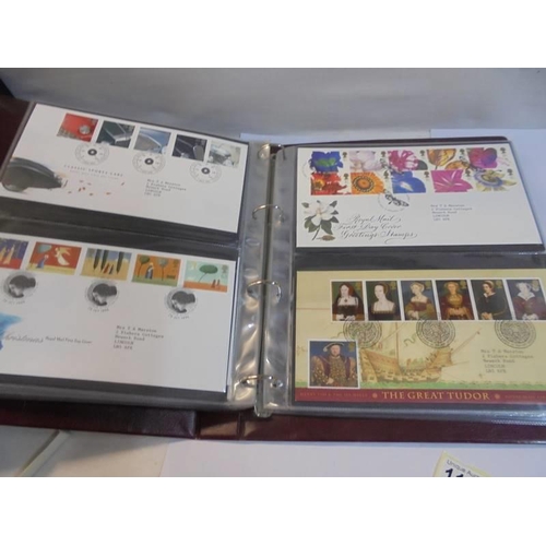 1180 - A Royal Mail first day covers album with 60 first day covers.