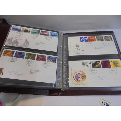 1180 - A Royal Mail first day covers album with 60 first day covers.