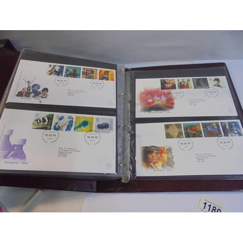 1180 - A Royal Mail first day covers album with 60 first day covers.