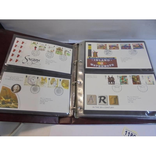 1180 - A Royal Mail first day covers album with 60 first day covers.