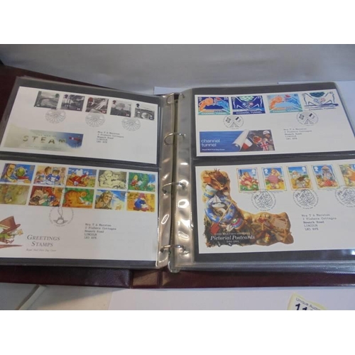 1180 - A Royal Mail first day covers album with 60 first day covers.