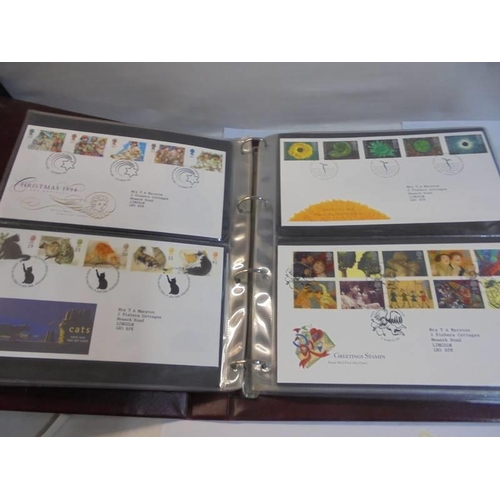 1180 - A Royal Mail first day covers album with 60 first day covers.