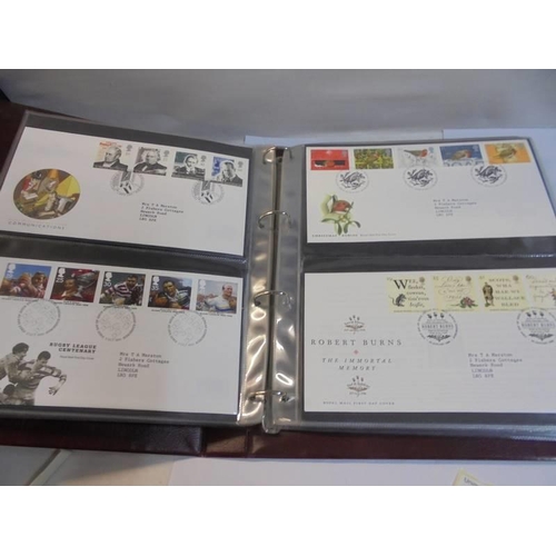 1180 - A Royal Mail first day covers album with 60 first day covers.