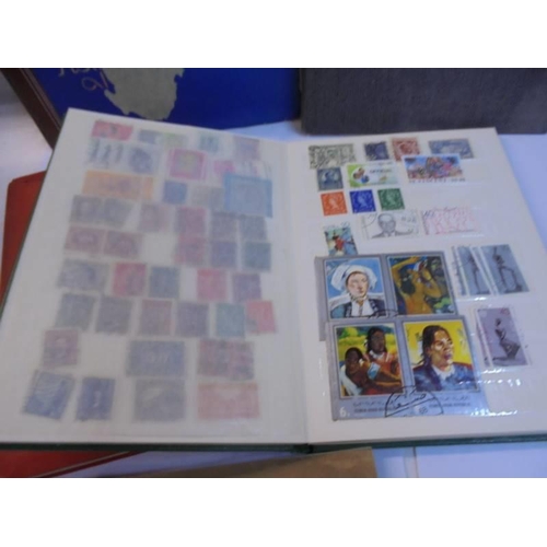 1182 - A collection of five albums of stamps including GB and commonwealth.