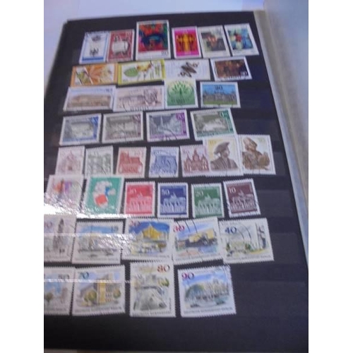 1182 - A collection of five albums of stamps including GB and commonwealth.