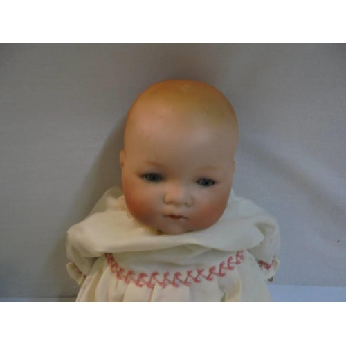 1187 - A 19th century porcelain headed baby doll.