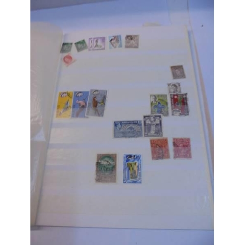 1192 - A collection  of five albums of commonwealth and world stamps.