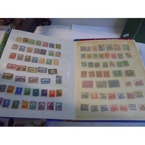 1192 - A collection  of five albums of commonwealth and world stamps.