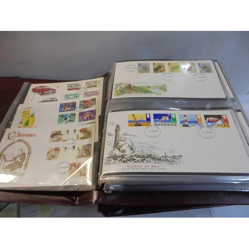 1194 - Three folders of first day covers.