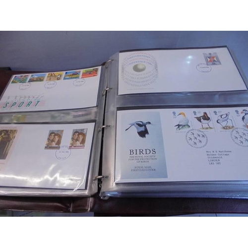 1194 - Three folders of first day covers.