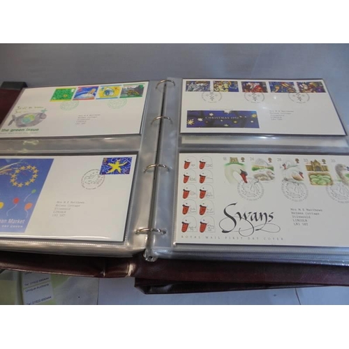 1194 - Three folders of first day covers.