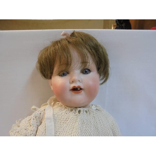 1197 - A 19th century German Armand Marseille porcelain doll marked 990 A-4-M.