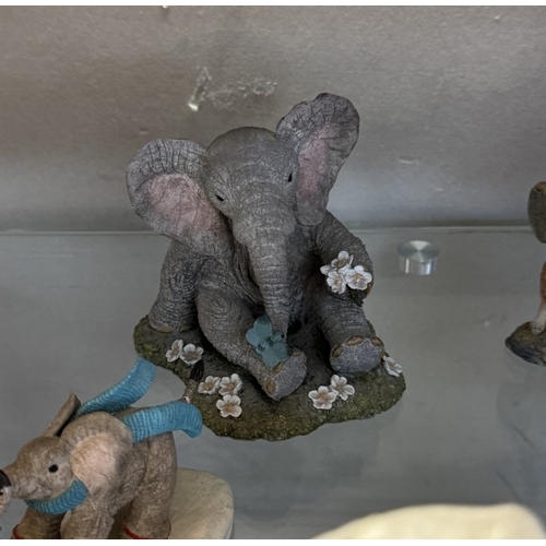 363 - A quantity of Tuskers elephant figures including working together CA03825 (limited edition of 600), ... 