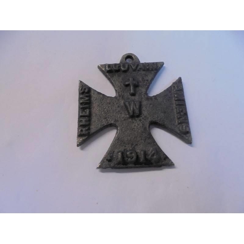 1200B - A WW1 anti German propaganda iron cross and an 1813 Imperial cross.