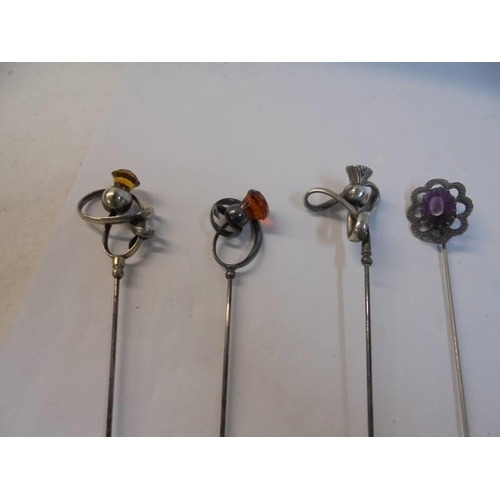 1200C - A collection of vintage Charles Horner hat pins.