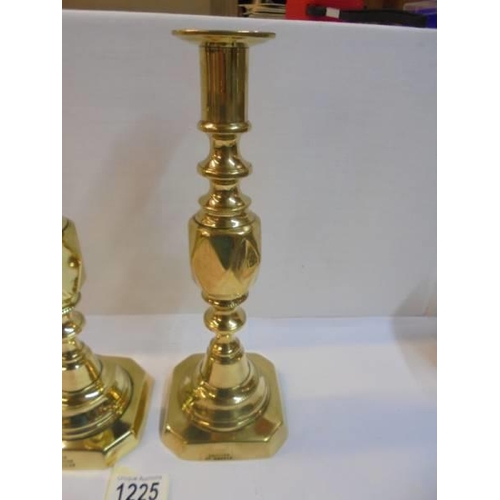 1225 - A pair of Victorian brass 'The Diamond Princess' candlesticks.