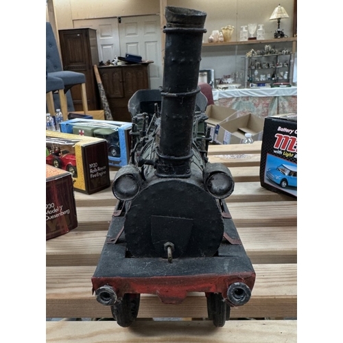 218 - A retro tin plate model of a steam train Length 39cm