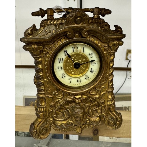 1126 - A French ormolu carriage clock.