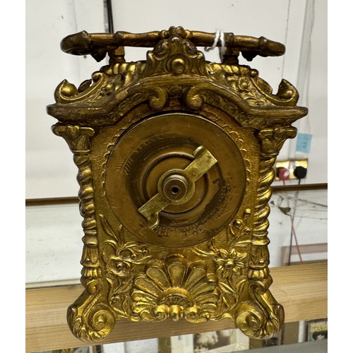 1126 - A French ormolu carriage clock.