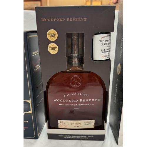 382 - A bottle of Tennessee Honey limited edition pack, Jim Beam double oak & Woodford reserve COLLECT ONL... 