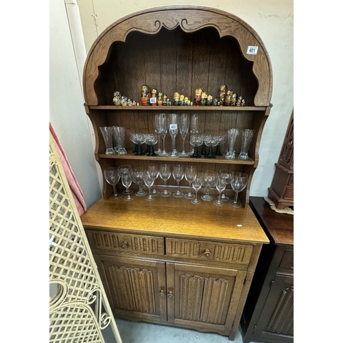 401 - An oak arch top dresser with linen fold doors. COLLECT ONLY.