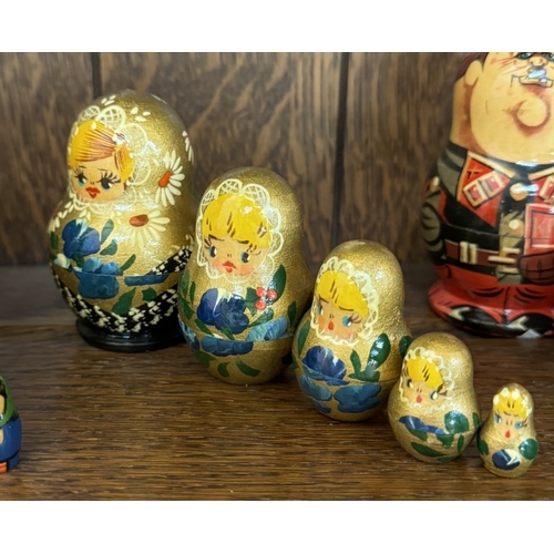 402 - 5 Russian nesting dolls all with 5 pieces