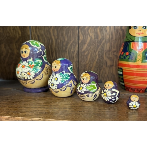 402 - 5 Russian nesting dolls all with 5 pieces