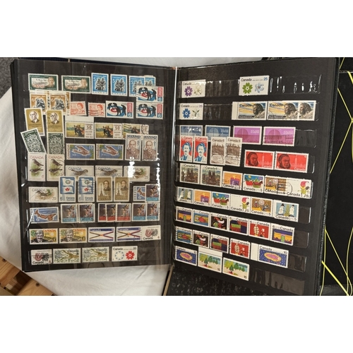 426 - A mixed lot of stamps in albums & boxes including Eire & Canada etc.