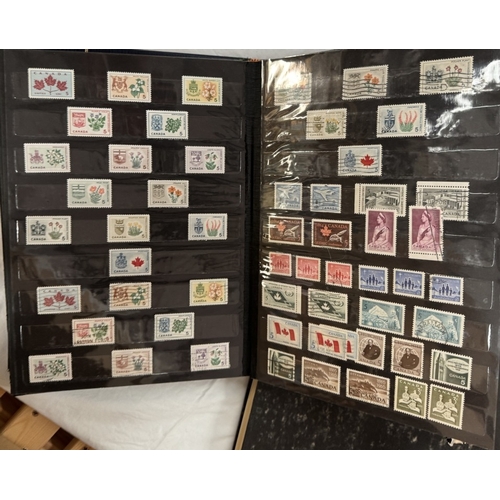 426 - A mixed lot of stamps in albums & boxes including Eire & Canada etc.