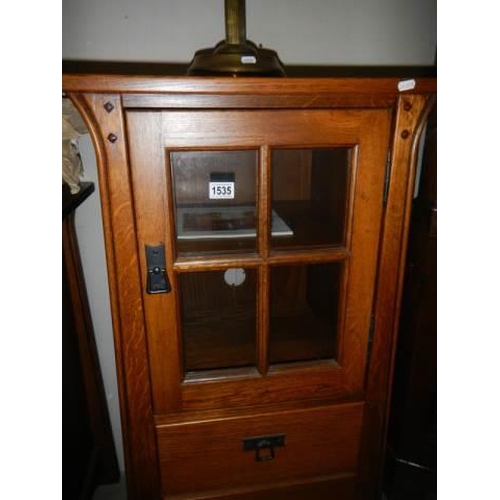 1535 - An arts and crafts cabinet, COLLECT ONLY.