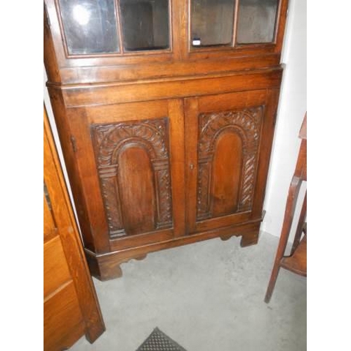 1536 - A good oak astragal glazed corner cabinet. COLLECT ONLY.