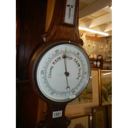 1551 - An Edwardian oak banjo aneroid barometer with porcelain dial, COLLECT ONLY.