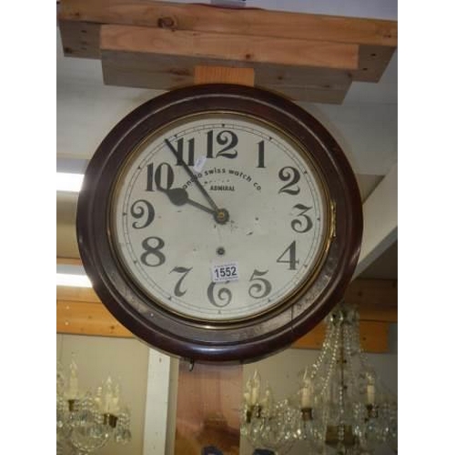 1552 - An old circular mahogany wall clock in working order. COLLECT ONLY