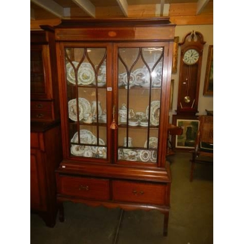 1554 - An Edwardian inlaid two drawer two door cabinet. COLLECT ONLY.