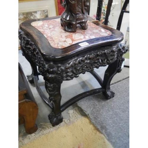 1557 - A carved Chinese table with marble inset top, COLLECT ONLY.