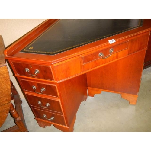 1567 - A good mahogany corner desk with leather inset top. COLLECT ONLY.