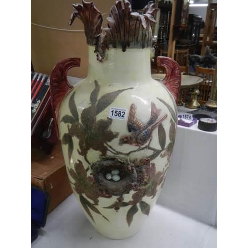 1582 - A large early 20th century vase featuring birds with a nest and eggs. COLLECT ONLY