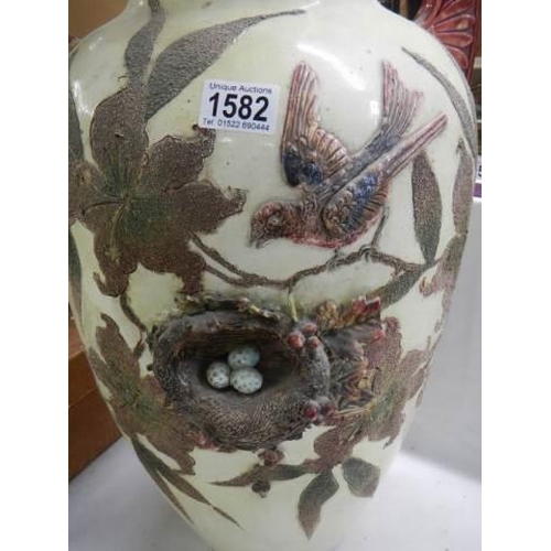 1582 - A large early 20th century vase featuring birds with a nest and eggs. COLLECT ONLY