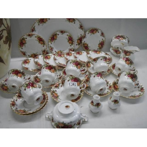 1583 - Thirty pieces of Royal Albert Old Country Roses table ware. COLLECT ONLY