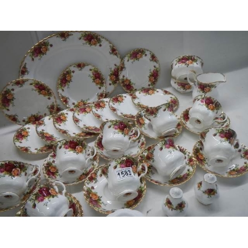 1583 - Thirty pieces of Royal Albert Old Country Roses table ware. COLLECT ONLY