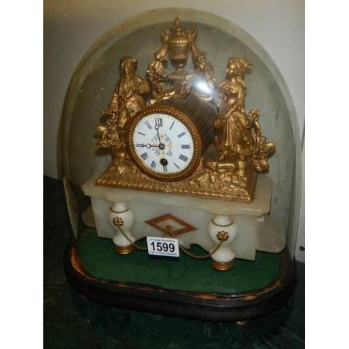 1599 - A Victorian mantel clock surmounted figures and under glass dome. in working order. COLLECT ONLY.